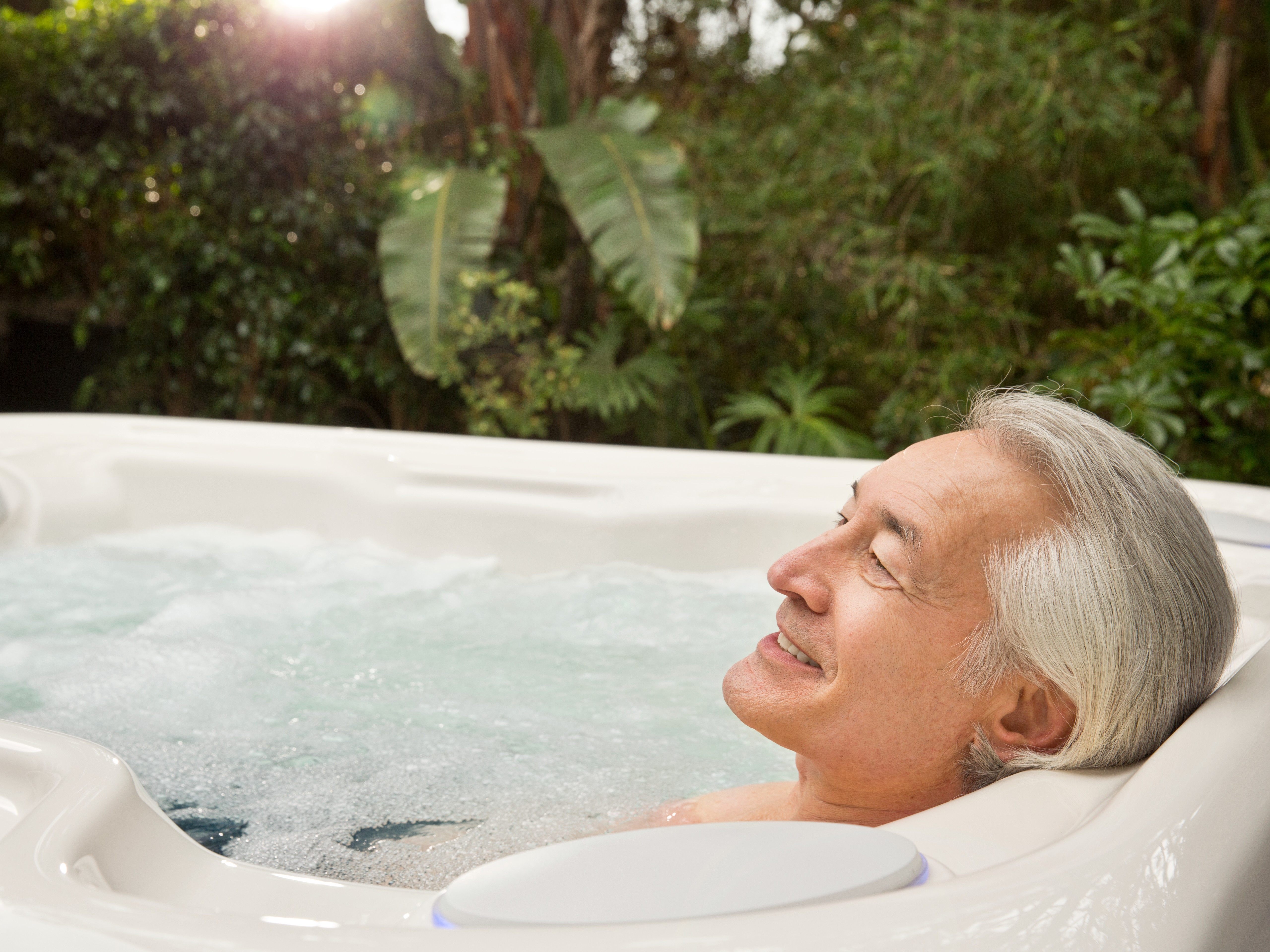 Soaking in a hot tub has the 'same health benefits' as going for a  30-minute jog, scientists reveal